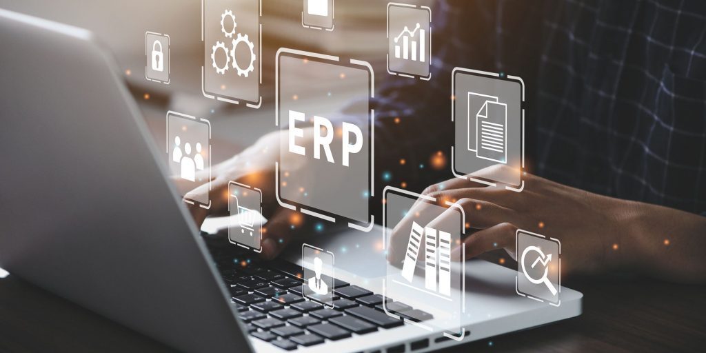 Businessman using a computer to document management for ERP. Enterprise resource planning concept.